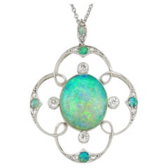 An opal and diamond Art Deco pendant