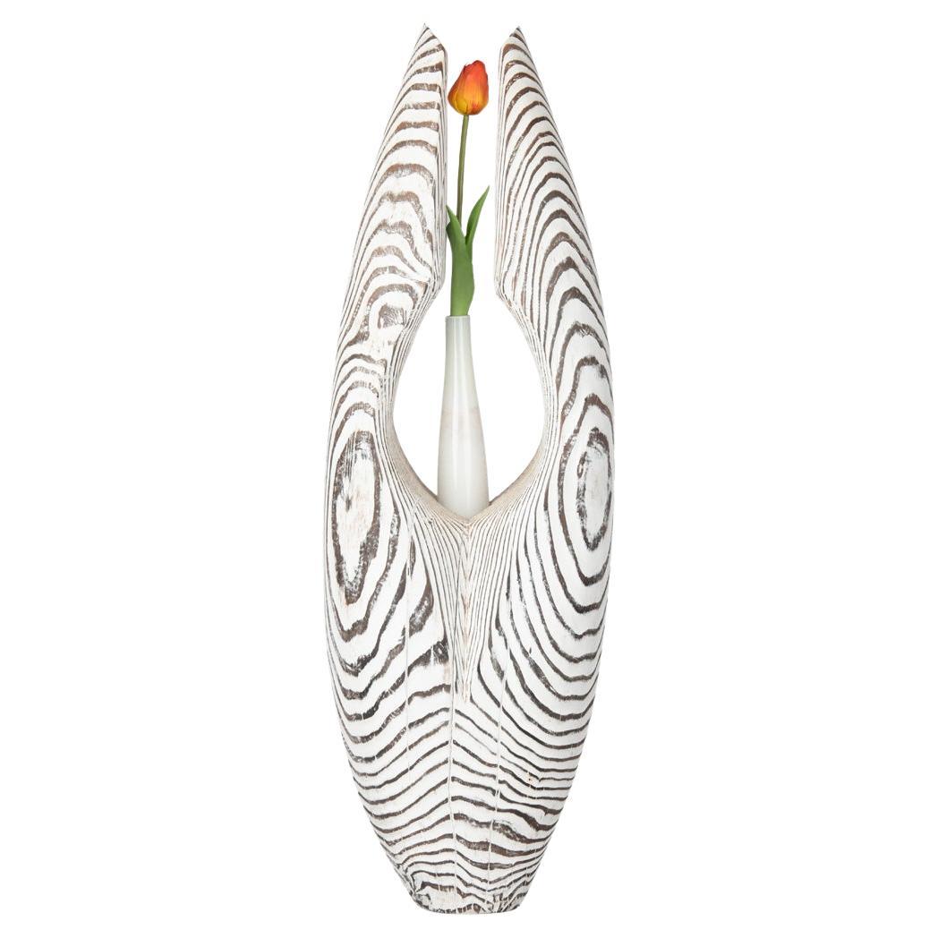An openwork oval driftwood sculpture/flower holder by Martin Scorey