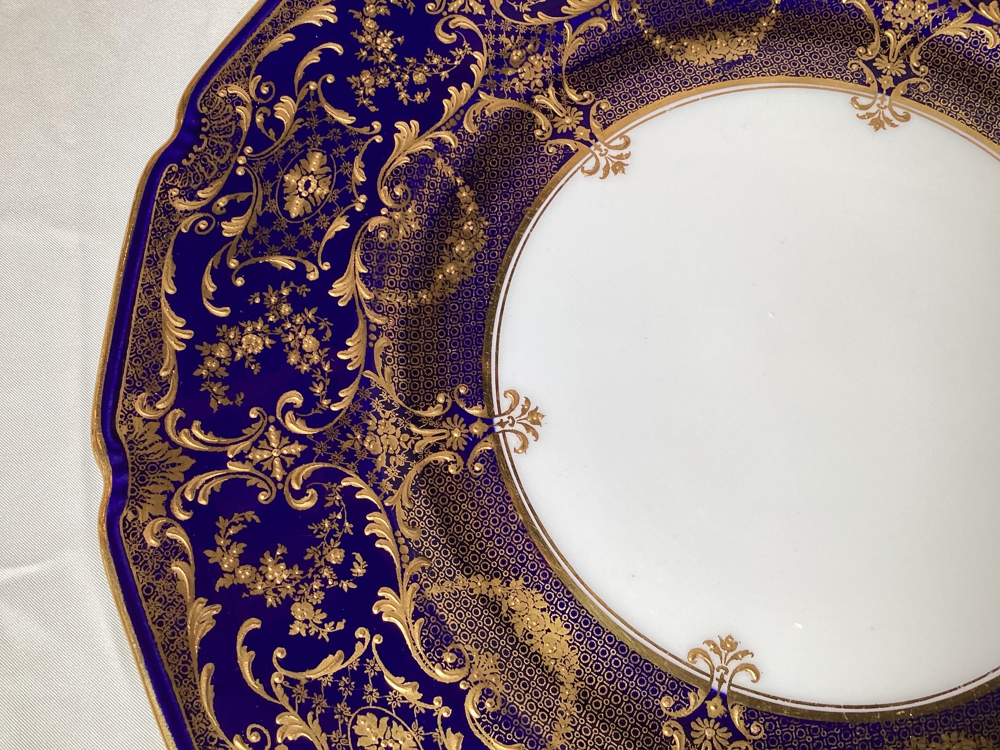 Early 20th Century Opulent Set of 12 Ornate English Raised Gilded Cobalt Dinner Service Plates