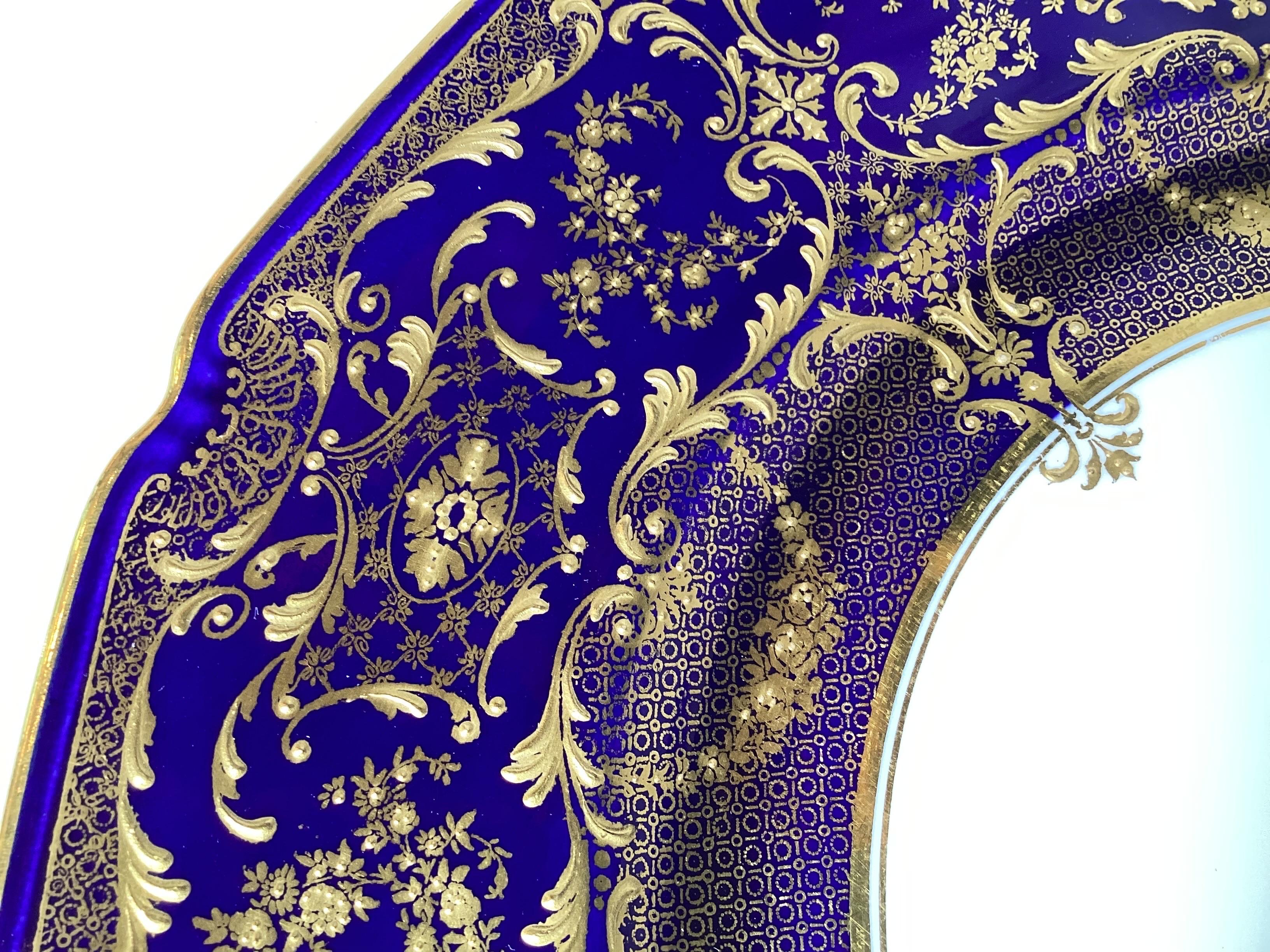 Porcelain Opulent Set of 12 Ornate English Raised Gilded Cobalt Dinner Service Plates
