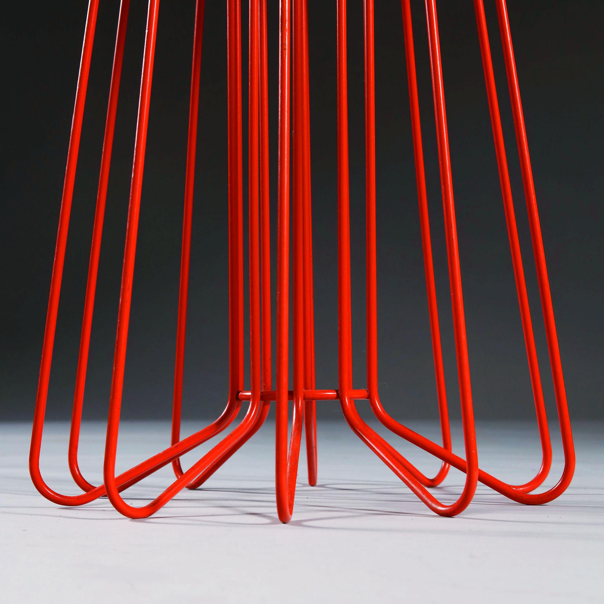 The Smallwire coffee tables are part of the Wire collection designed by Arik Levy for Zanotta in 2007. The coffee tables have a steel structure painted black, red, orange or white and an 8 mm thick tempered plate glass top, painted black, red or