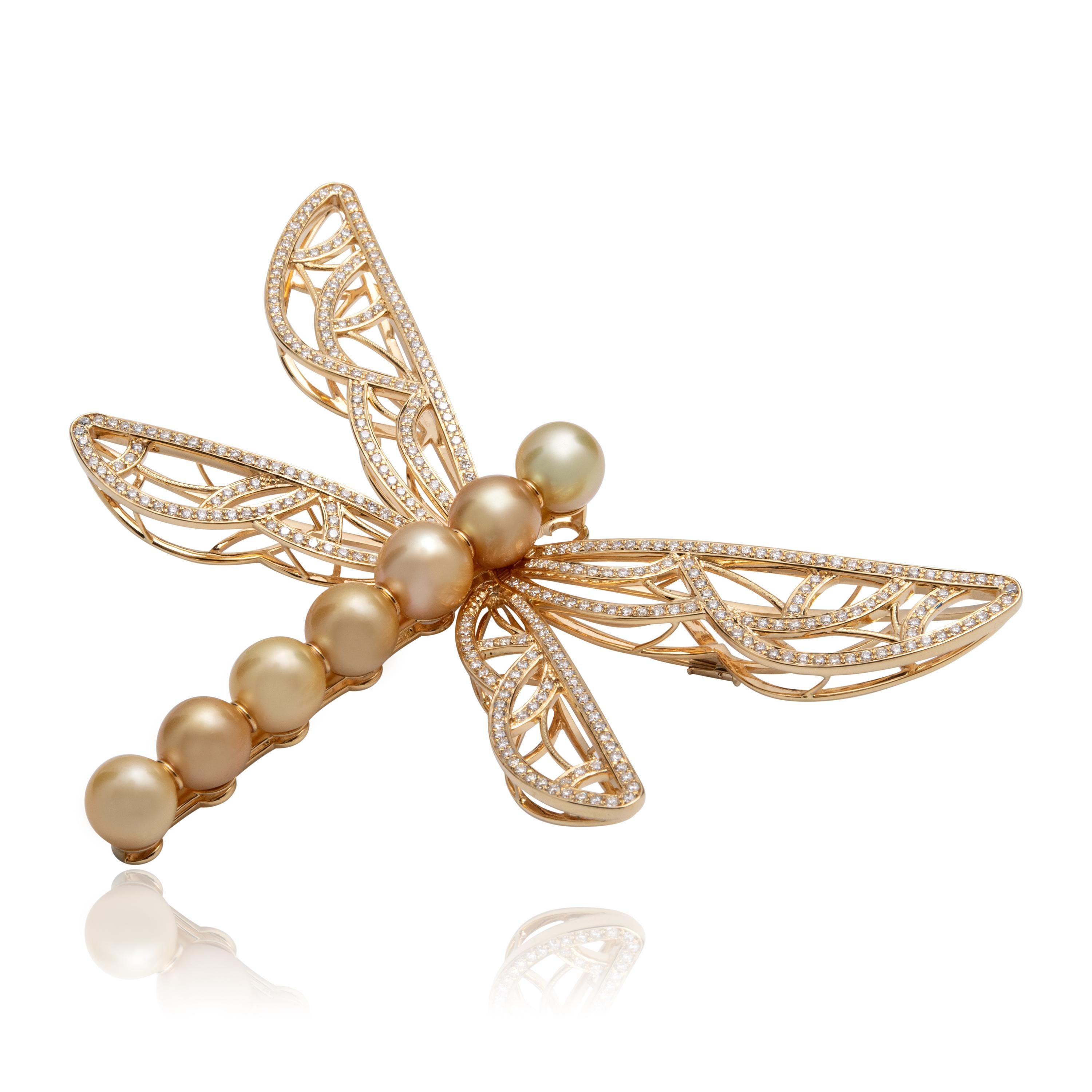 Collection: The Gem Made Me Do It
Title: “The Gold Dragonfly” Brooch and Pendant

These 7 Golden South Sea Pearls really wanted to be the body of a dragonfly.  2 minutes after she was shown these 7 pearls in a row by her Japanese Pearl trader , the