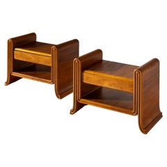Used An organic pair of bedside tables made of teak, Italy, 1930s