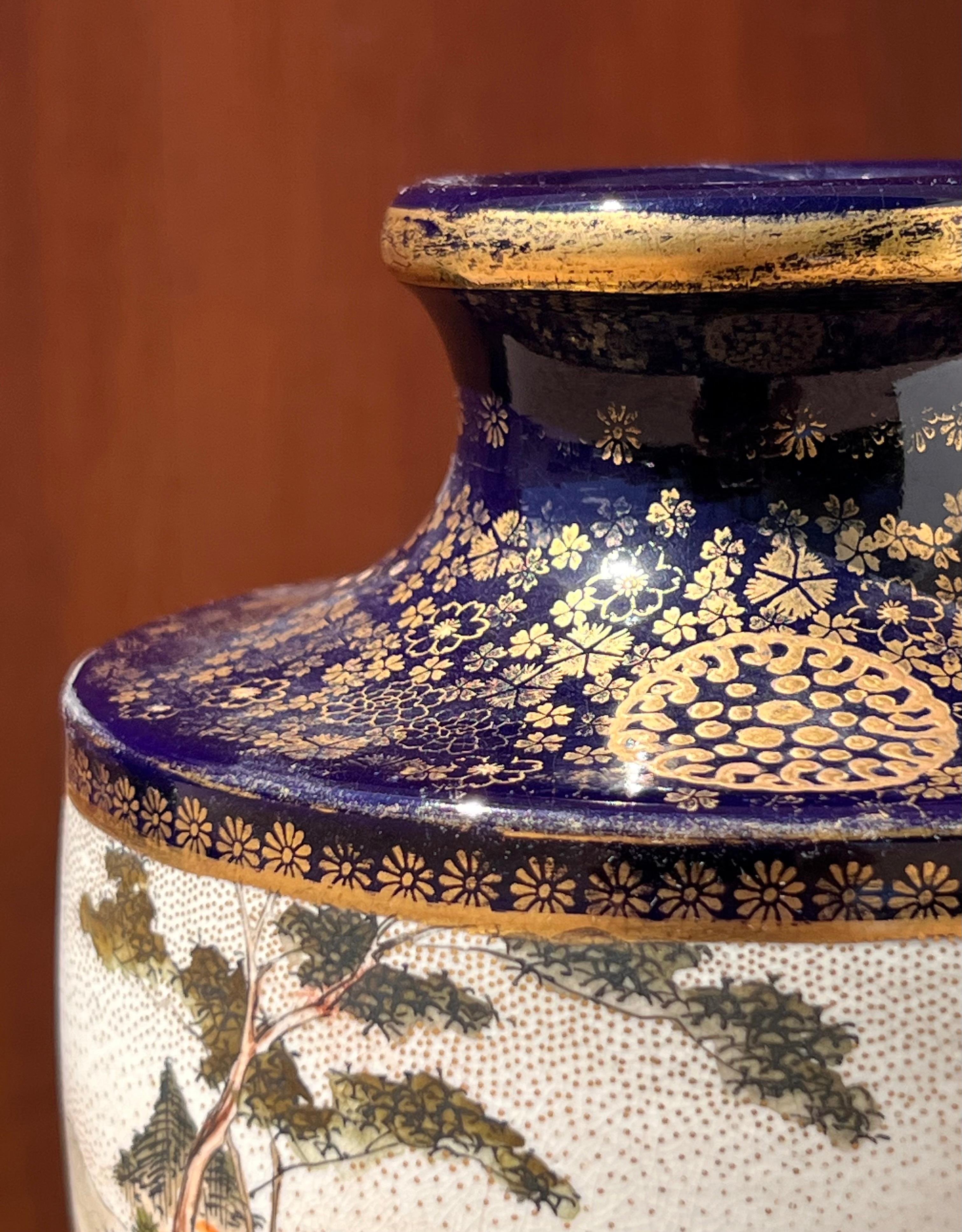 Chinoiserie An oriental hand-painted porcelain glazed vase with gilt detail, 20th century For Sale