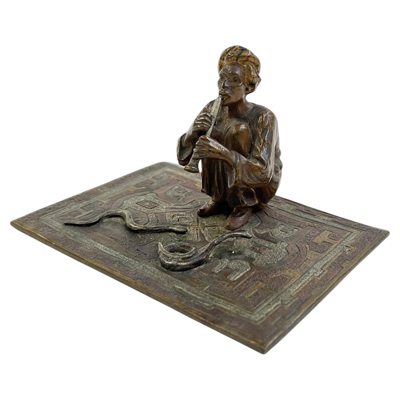 An Orientalist Cold-Painted Bronze Sculpture Of A Snake Charmer, Franz Bergman