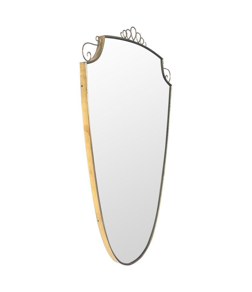 Mid-Century Modern Original 1950s Italian Brass Framed Shield Mirror with Decorative Scroll Top