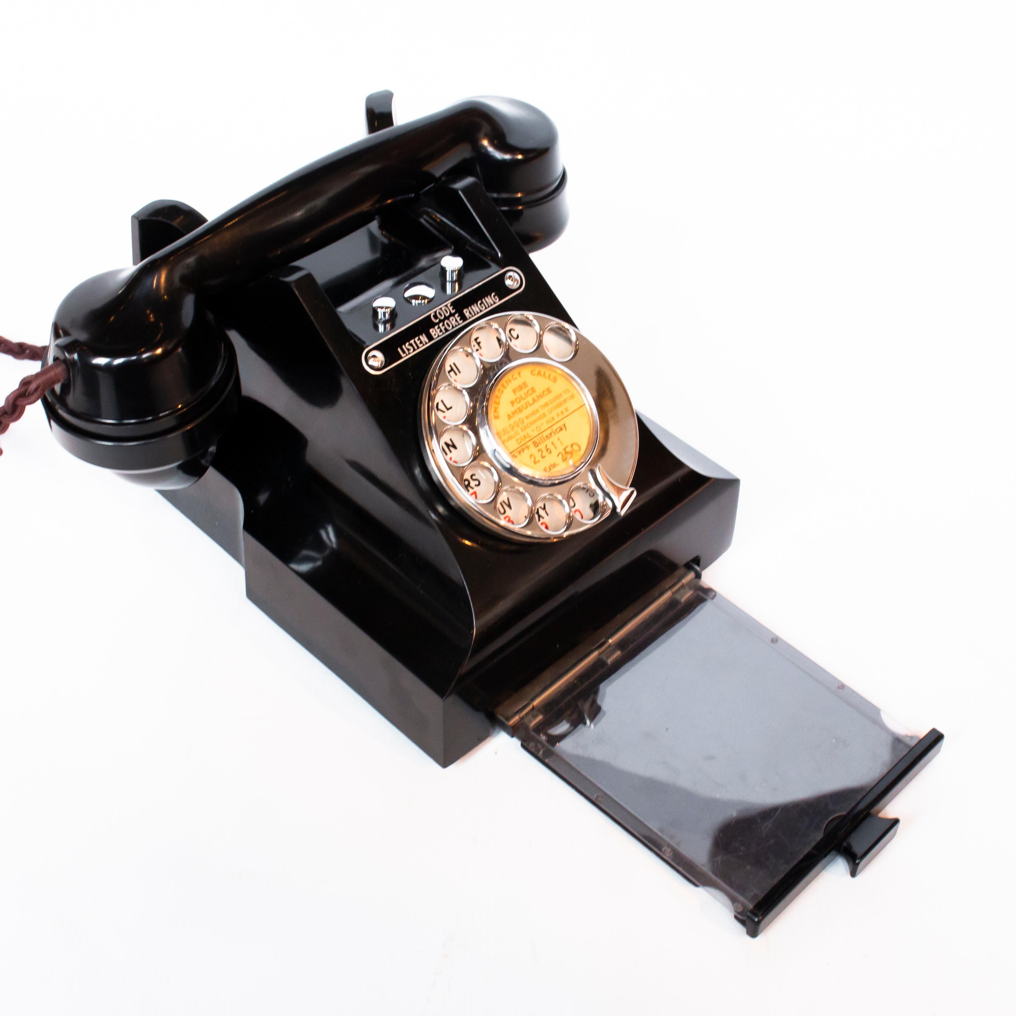 An original 1951 GPO model 332 telephone. 