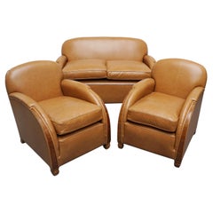 Vintage An Original Art Deco Three Piece Lounge Suite Re-Upholstered in Tan Leather