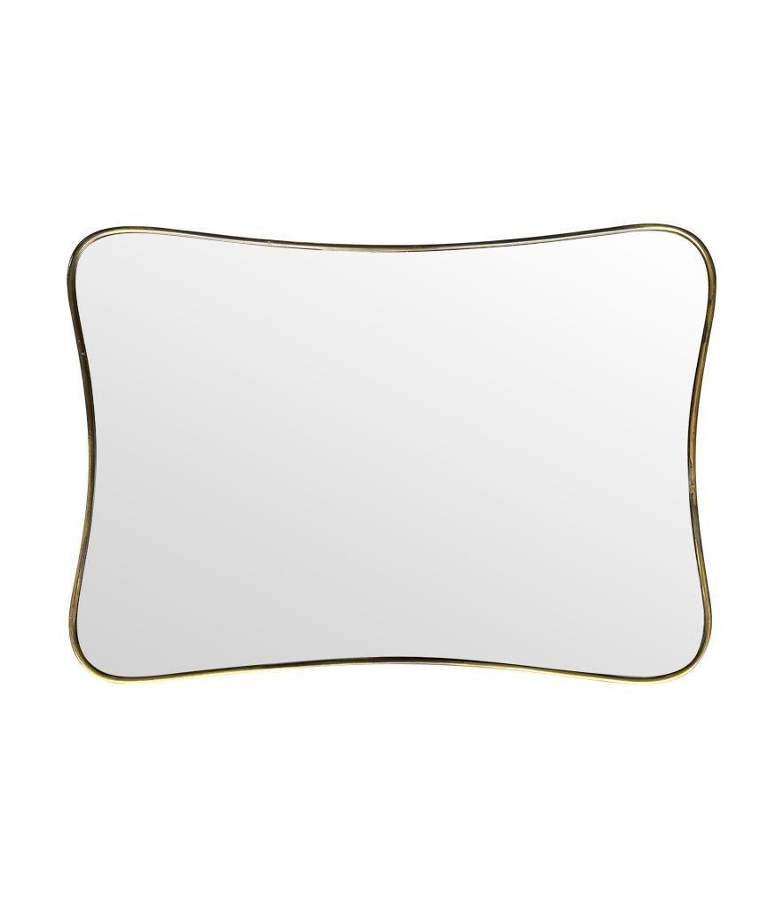 An original Italian 1950s brass framed mirror with shaped curved corners. For Sale 6