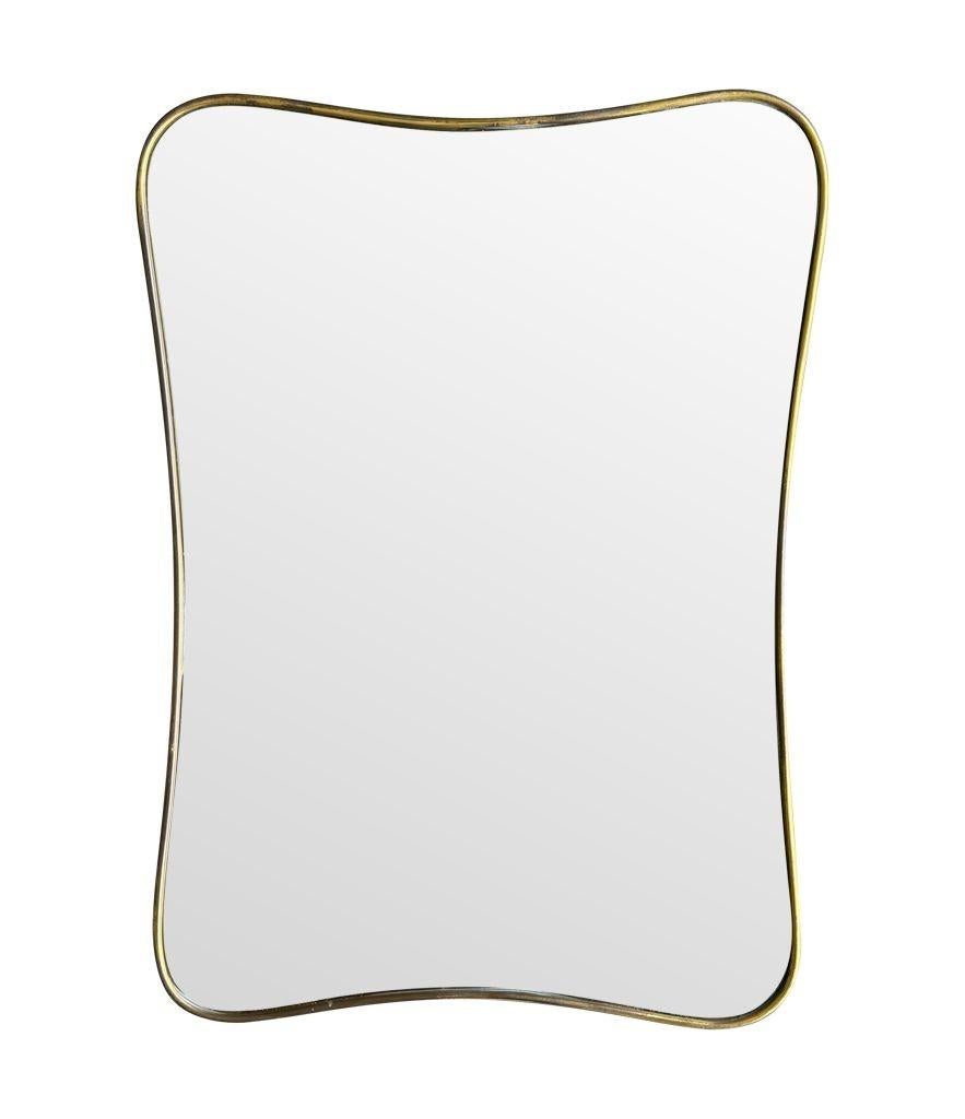 An original Italian 1950s brass framed mirror with shaped curved corners. For Sale 7