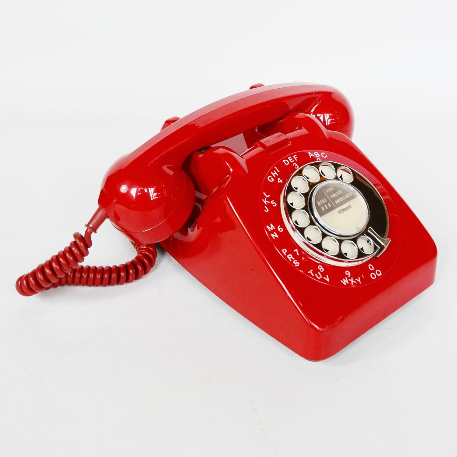 An original red lacquered GPO model 706L telephone. Bell control switch at front.

Dimensions: H 14.5cm, W 10cm, D 22cm

Origin: English

Date: circa 1960

Item No: 1102014

All of our telephones are fully refurbished, re-wired and in full