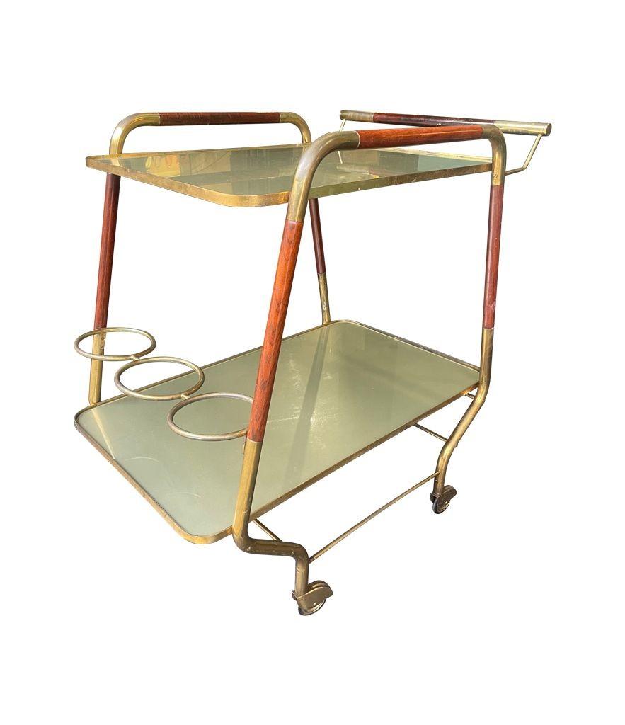 Brass An original unusual designed Italian 1950s lacquered wood and brass bar trolley For Sale