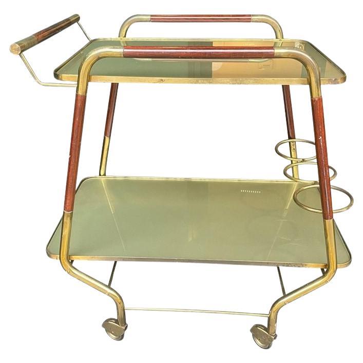 An original unusual designed Italian 1950s lacquered wood and brass bar trolley For Sale