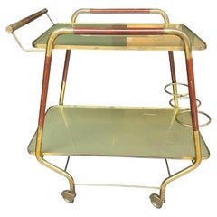 Chariot de bar en bois laqué et laiton italien des années 1950, au design original et inhabituel.