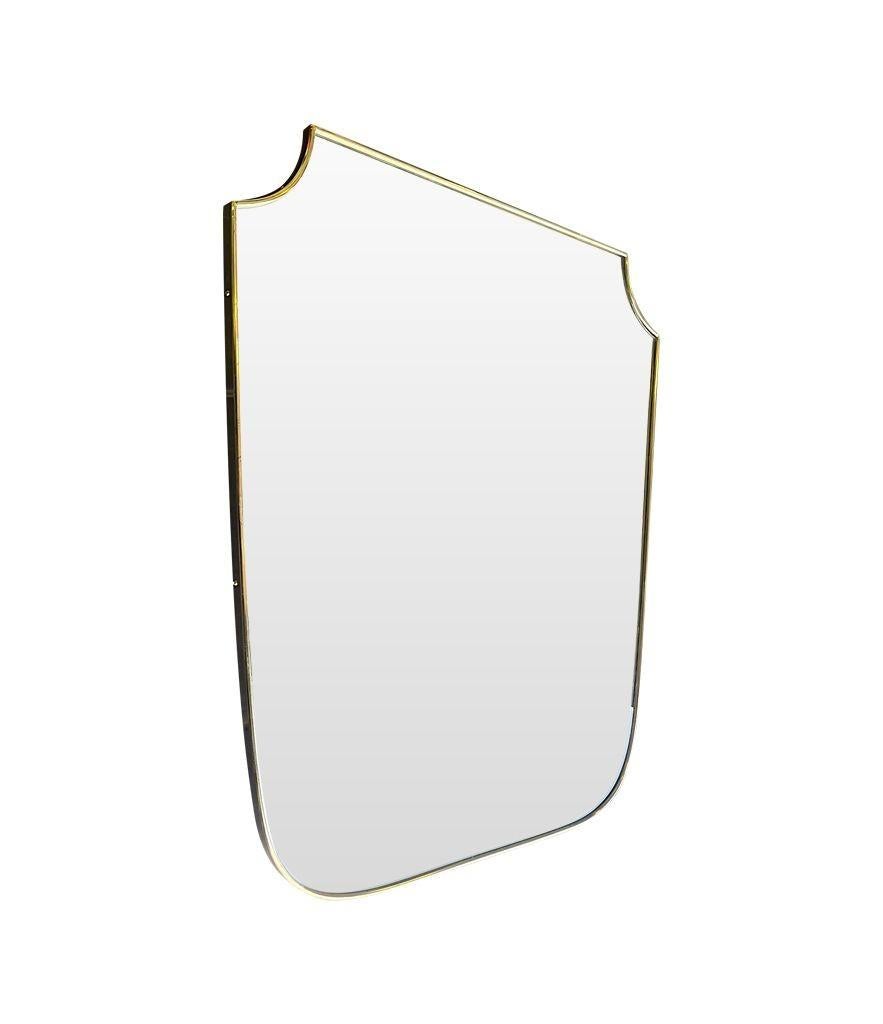 Orignal 1950s Italian Brass Framed Shield Mirror of Good Proportions In Good Condition For Sale In London, GB