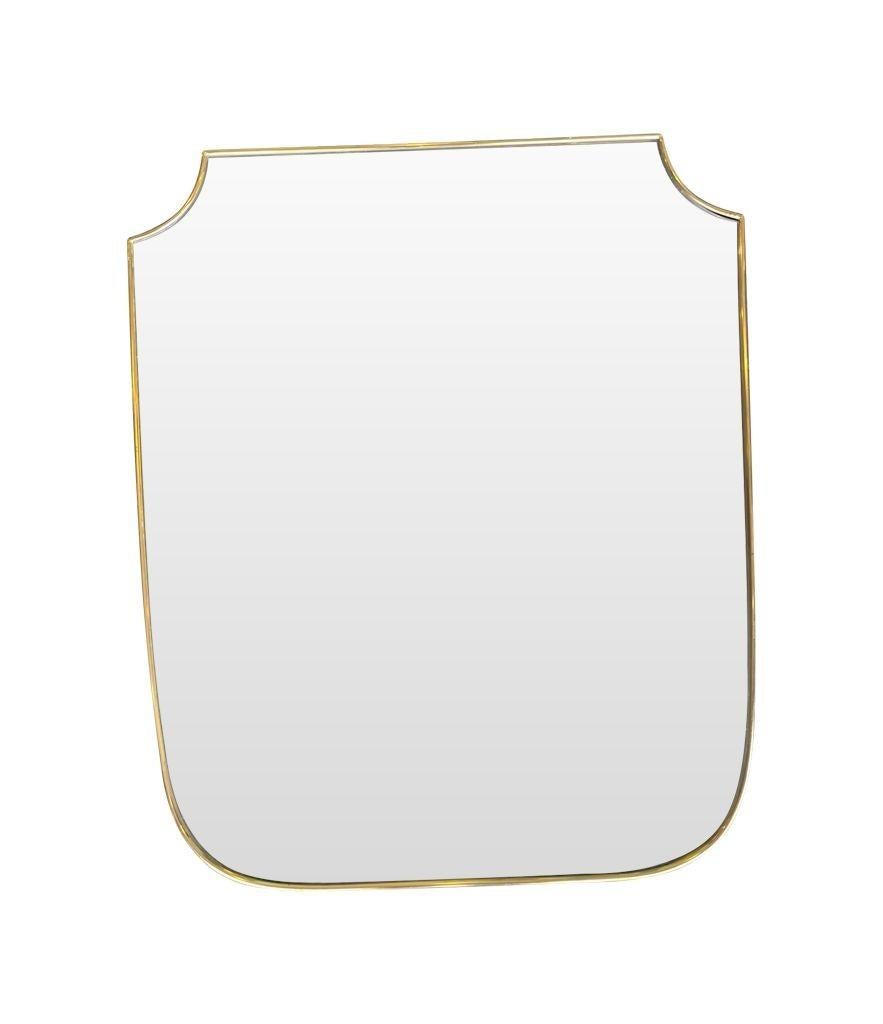 Mid-20th Century Orignal 1950s Italian Brass Framed Shield Mirror of Good Proportions For Sale