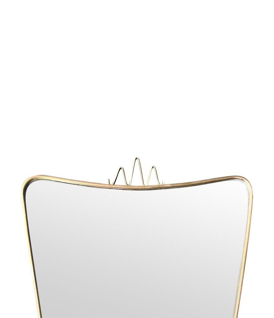Laiton The original Italian 1950s brass shield mirror in the style of Gio Ponti en vente