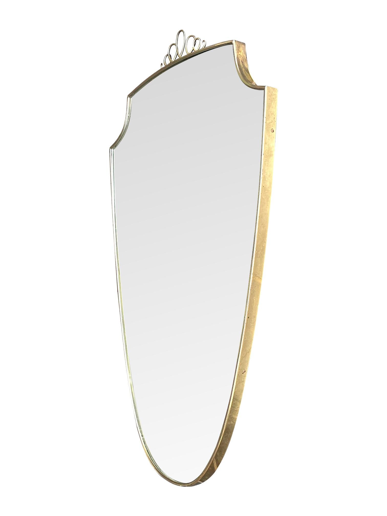 Original 1950s Italian Brass Shield Mirror with Central Decorative Top Detail 2