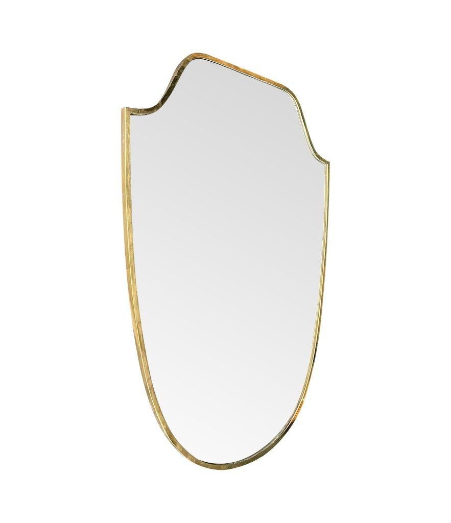 20th Century An orignal 1950s Italian shield mirror with solid wood back For Sale