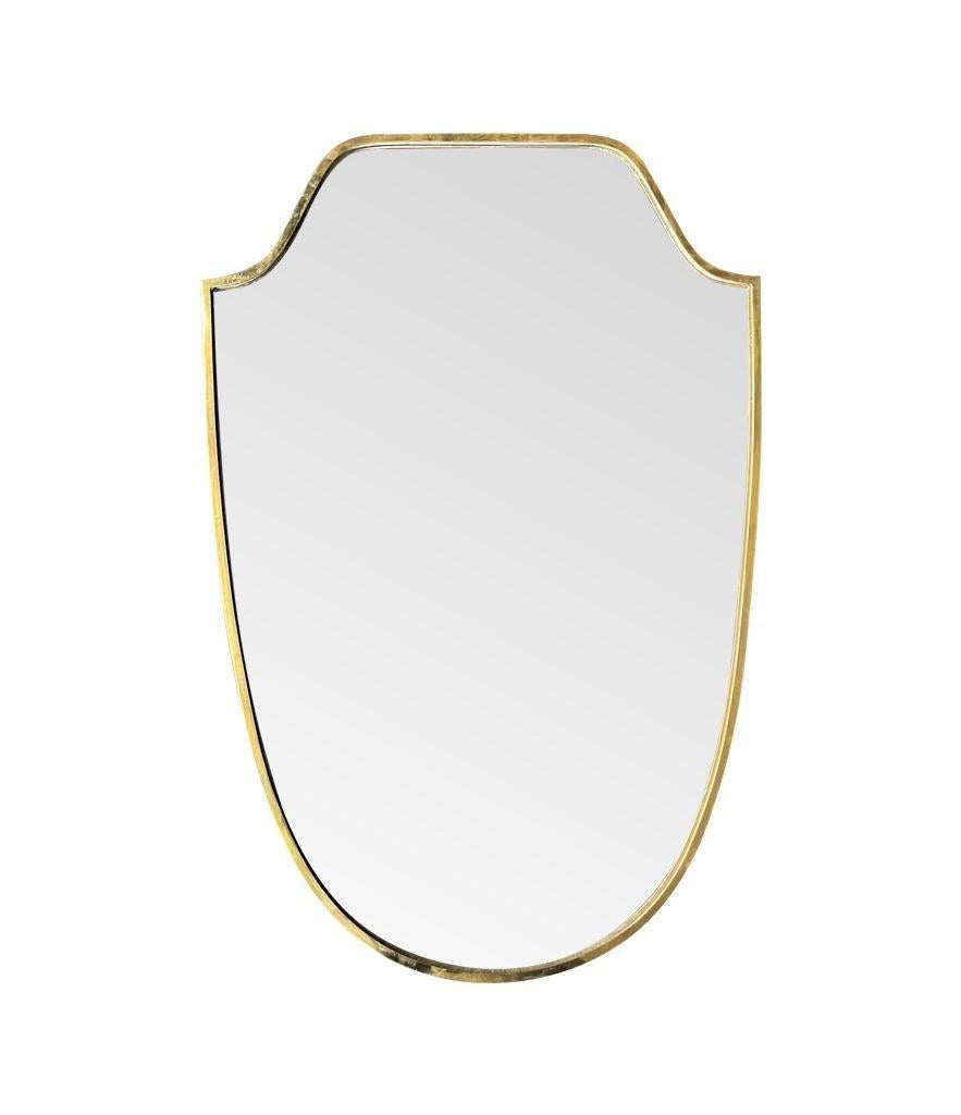 An orignal 1950s Italian shield mirror with solid wood back For Sale 1