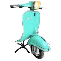 An orignal 1960s floor lamp made from half a Piaggio Vespa sprint 150