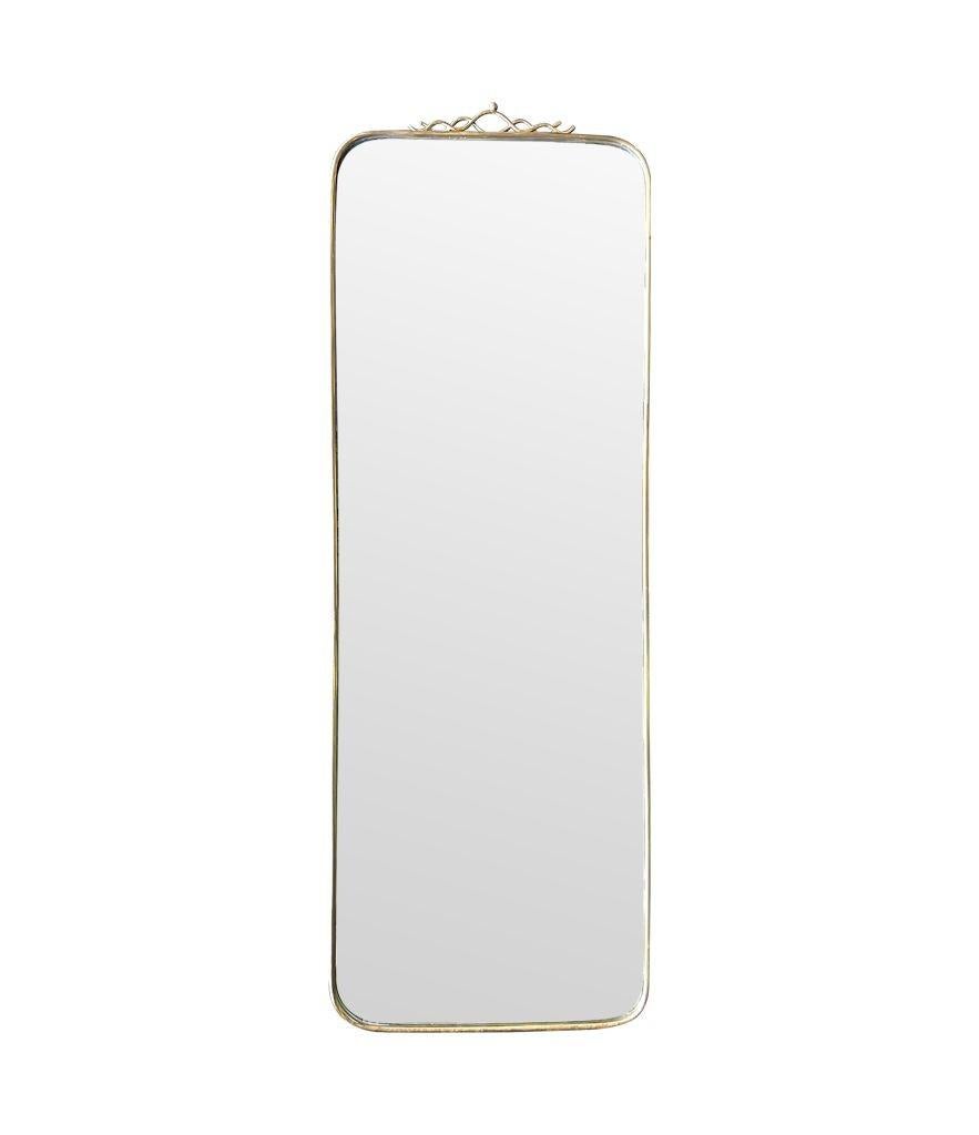 An orignal Italian 1950s brass framed mirror with scroll top detail For Sale 1