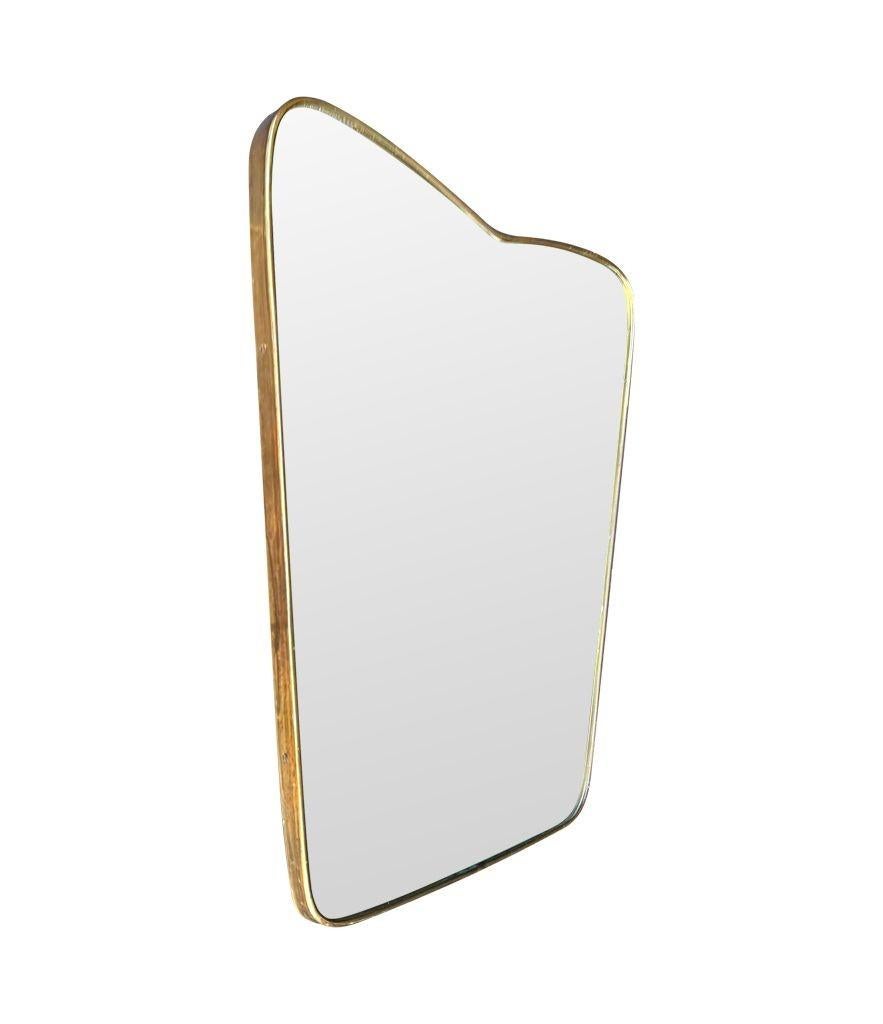 An orignal Italian 1950s brass frmed mirror with shaped top For Sale 7