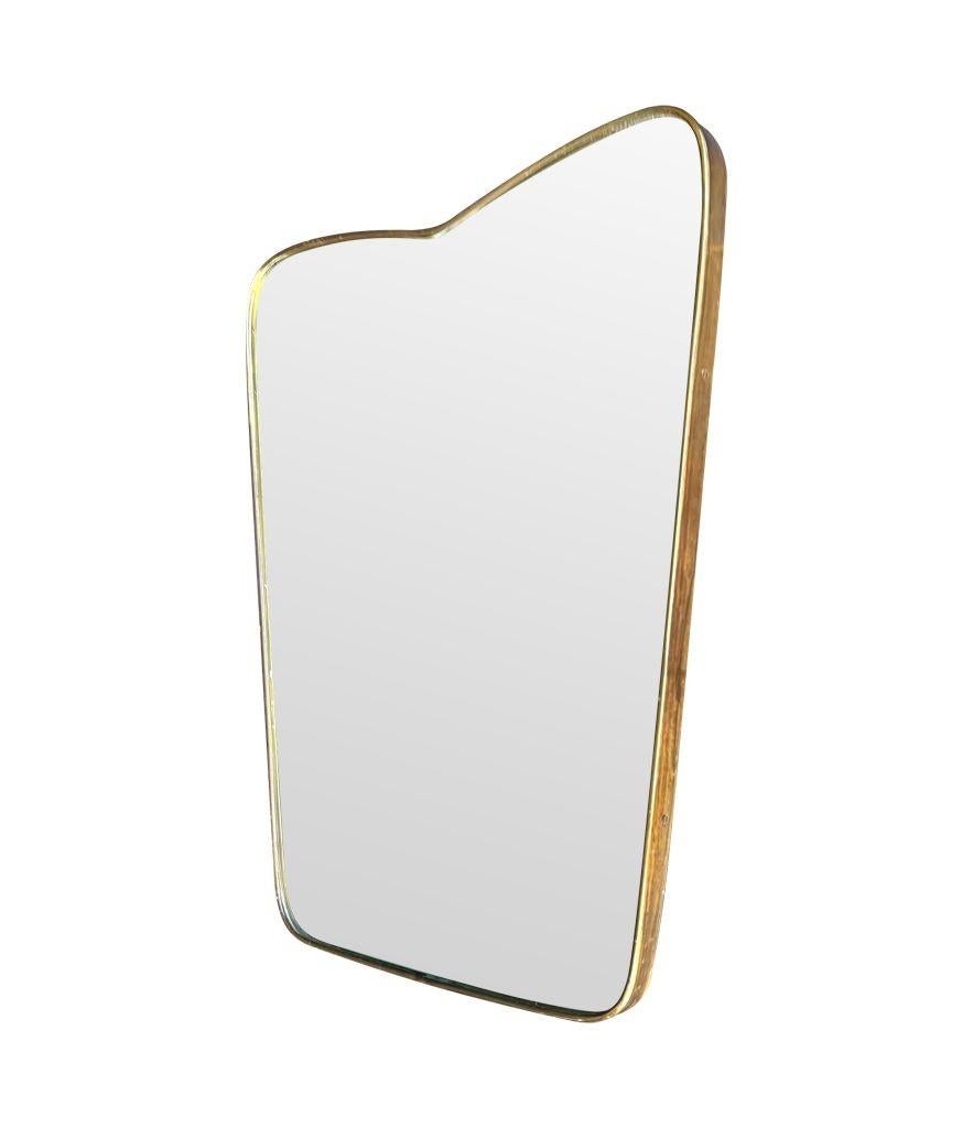 An orignal Italian 1950s brass frmed mirror with shaped top For Sale 9