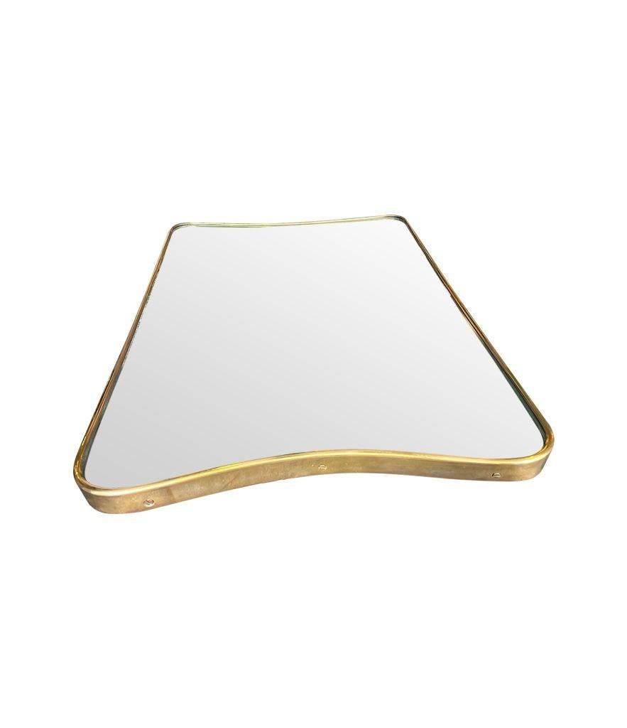 Mid-20th Century An orignal Italian 1950s brass shield mirror attributed to Gio Ponti For Sale