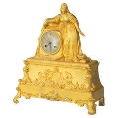 Antique An ormolu mantel clock with Queen Victoria in medieval dress, by Monroux, 1832