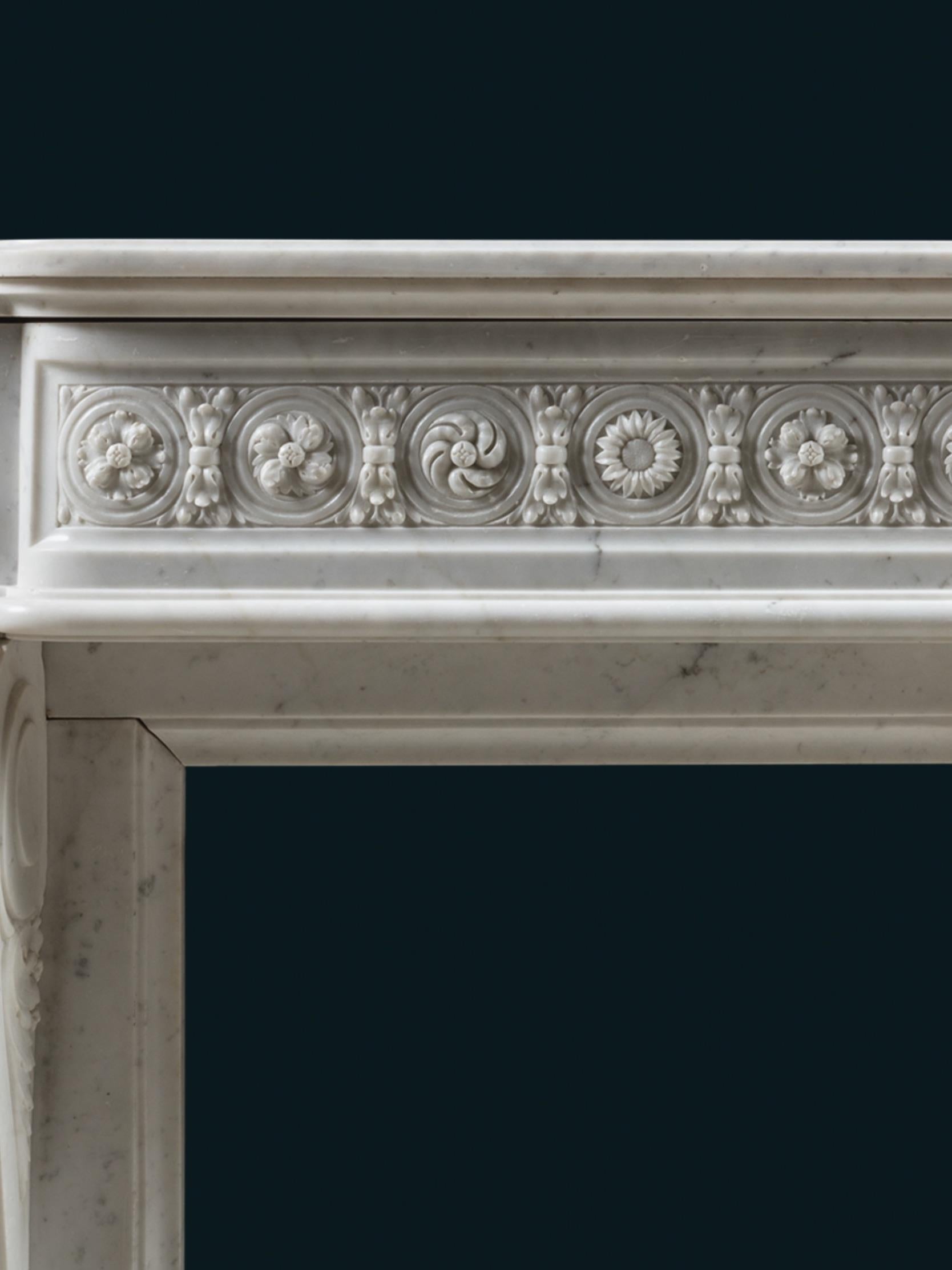 Hand-Carved An Ornate 19th Century Louis XVI Style Chimneypiece For Sale
