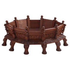 An ornate figural carved hardwood pet bed. 20th C.