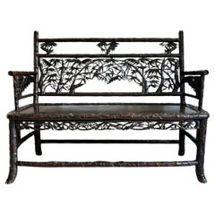 An Ornately Carved Late 19th C Chinese Hardwood Bench