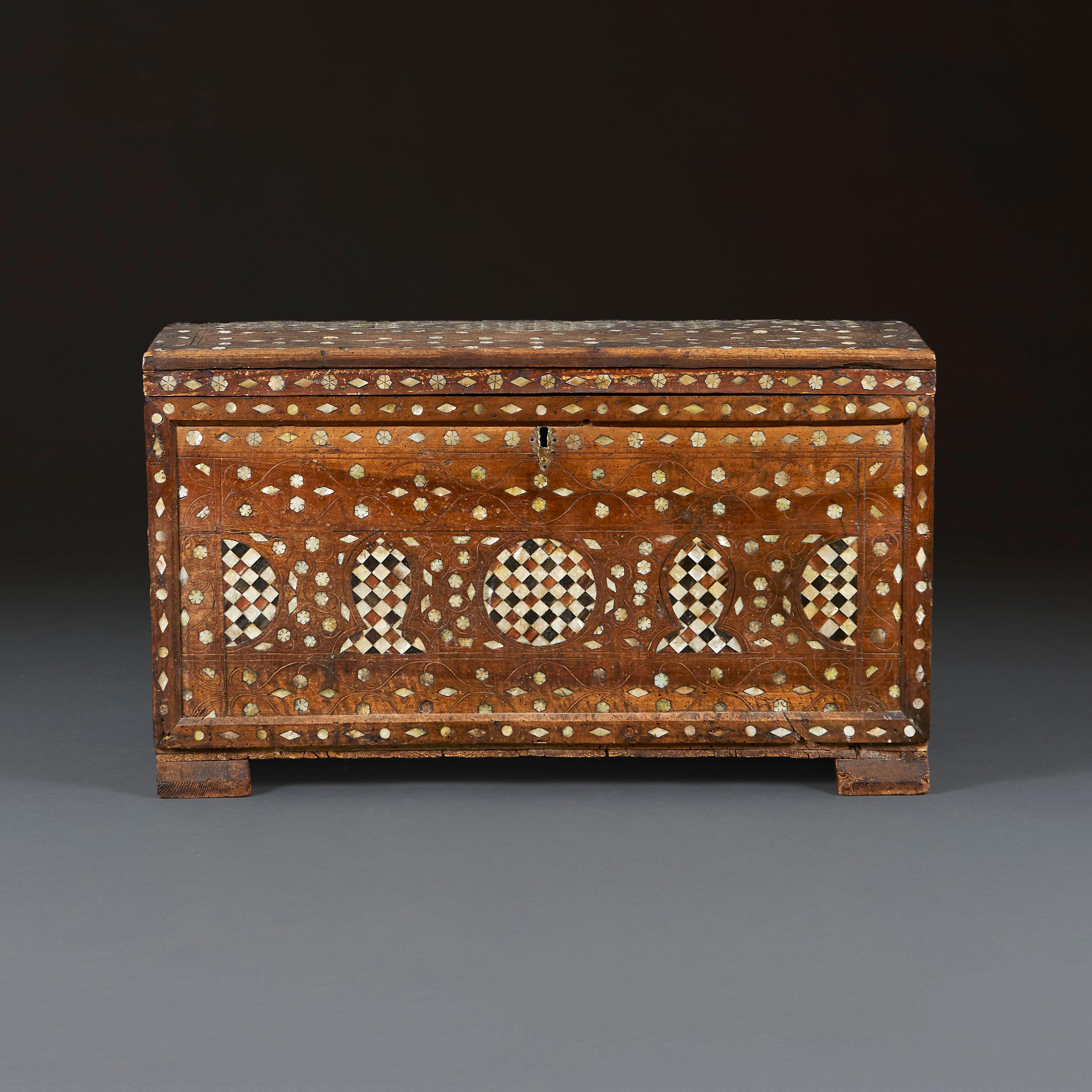 Turkey, circa 1750

A mid eighteenth century cypress wood trunk, inlaid with faux tortoiseshell and mother of pearl throughout.

Height 58.00cm
Width 101.00cm
Depth 54.00cm

