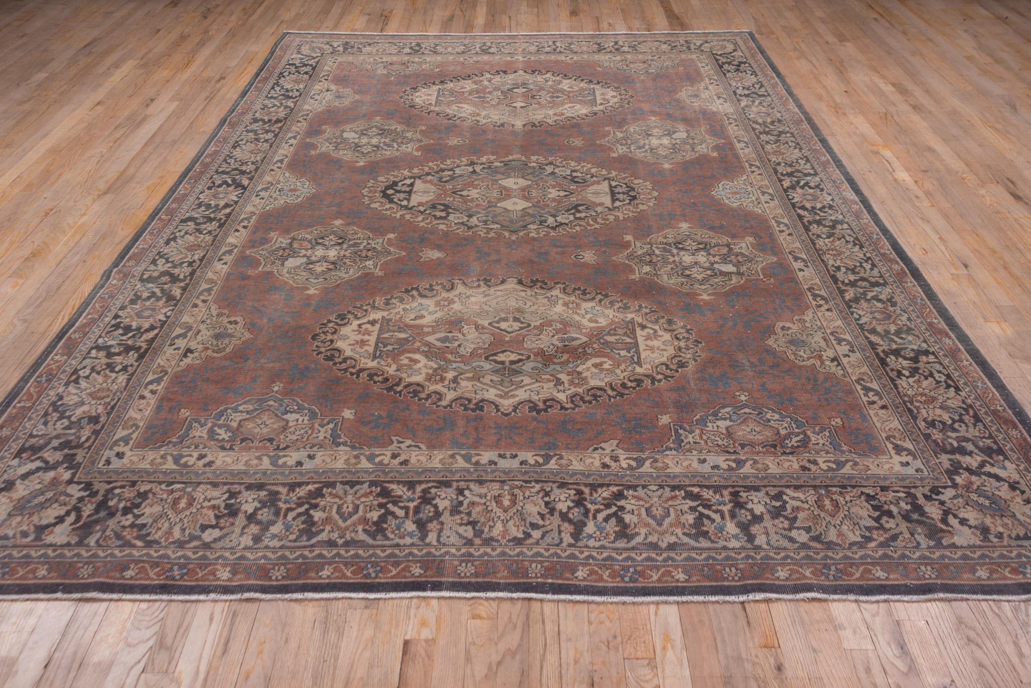 An Oushak Rug circa 1940. Hand knotted, made of 100% wool yarn.