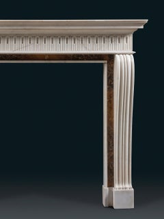 An Outstanding Mid-18th Century Fireplace in Statuary and Sienna Marbles