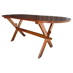 An oval dining table circa 1960