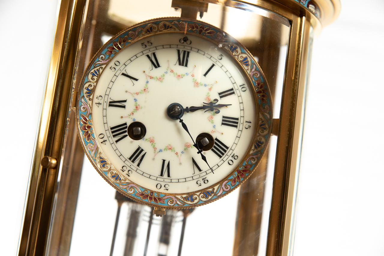 A fine oval shaped brass champléve four glass clock, with an hour and half hour striking movement on a gong. The movement signed by the makers S Marti of Paris, France. Dated late 19th century, and is numbered 1231.
The Fine mercury pendulum is