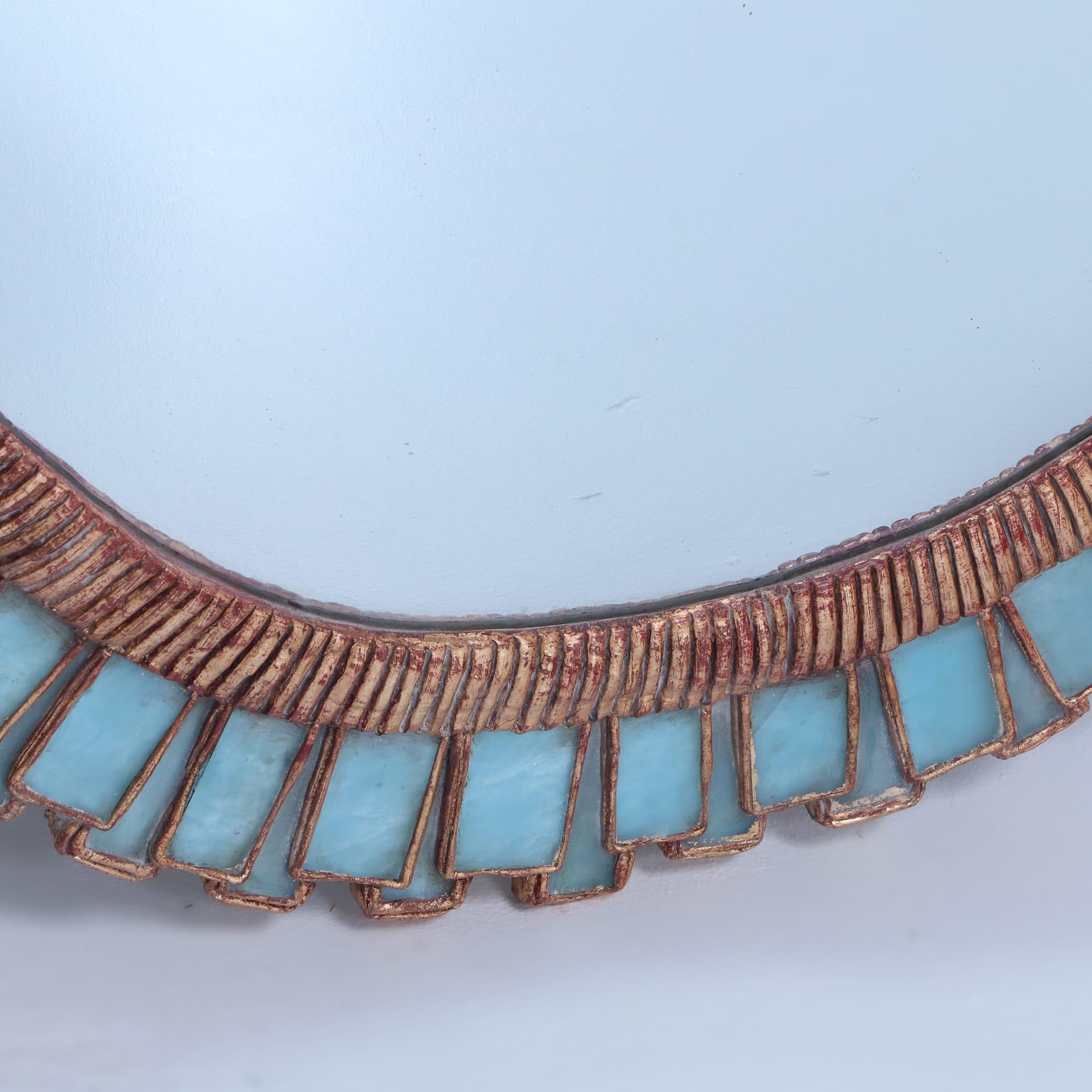 Contemporary An oval mirror made of gilt resin and blue glass in the manner of Line Vautrin.  For Sale
