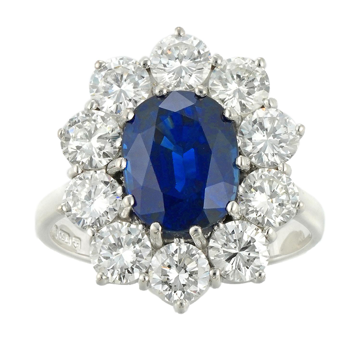 Modern GCS Certified 3.74 Carat Oval Sapphire and Diamond Cluster Ring