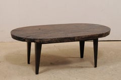 Oval-Shaped Teak Slab Top Coffee Table Raised on Custom Iron Legs