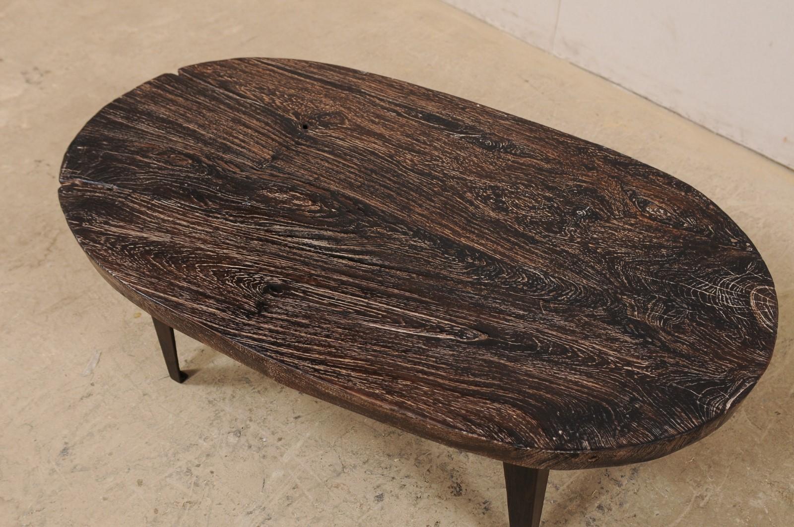 Indonésien Table basse ovale en teck sur pieds en fer sur mesure en vente