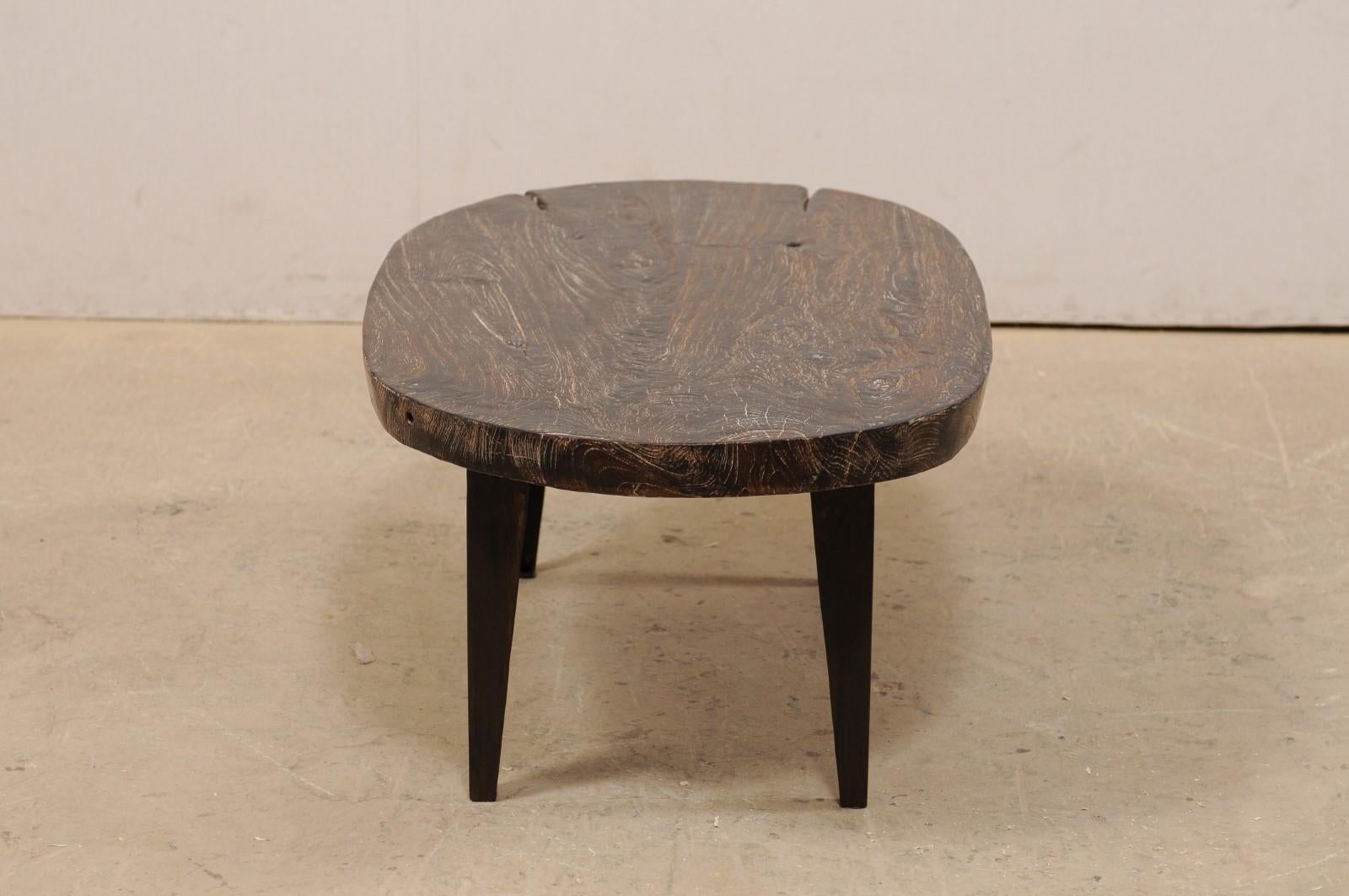 Oval-Shaped Teak Slab Top Coffee Table Raised on Custom Iron Legs For Sale 3