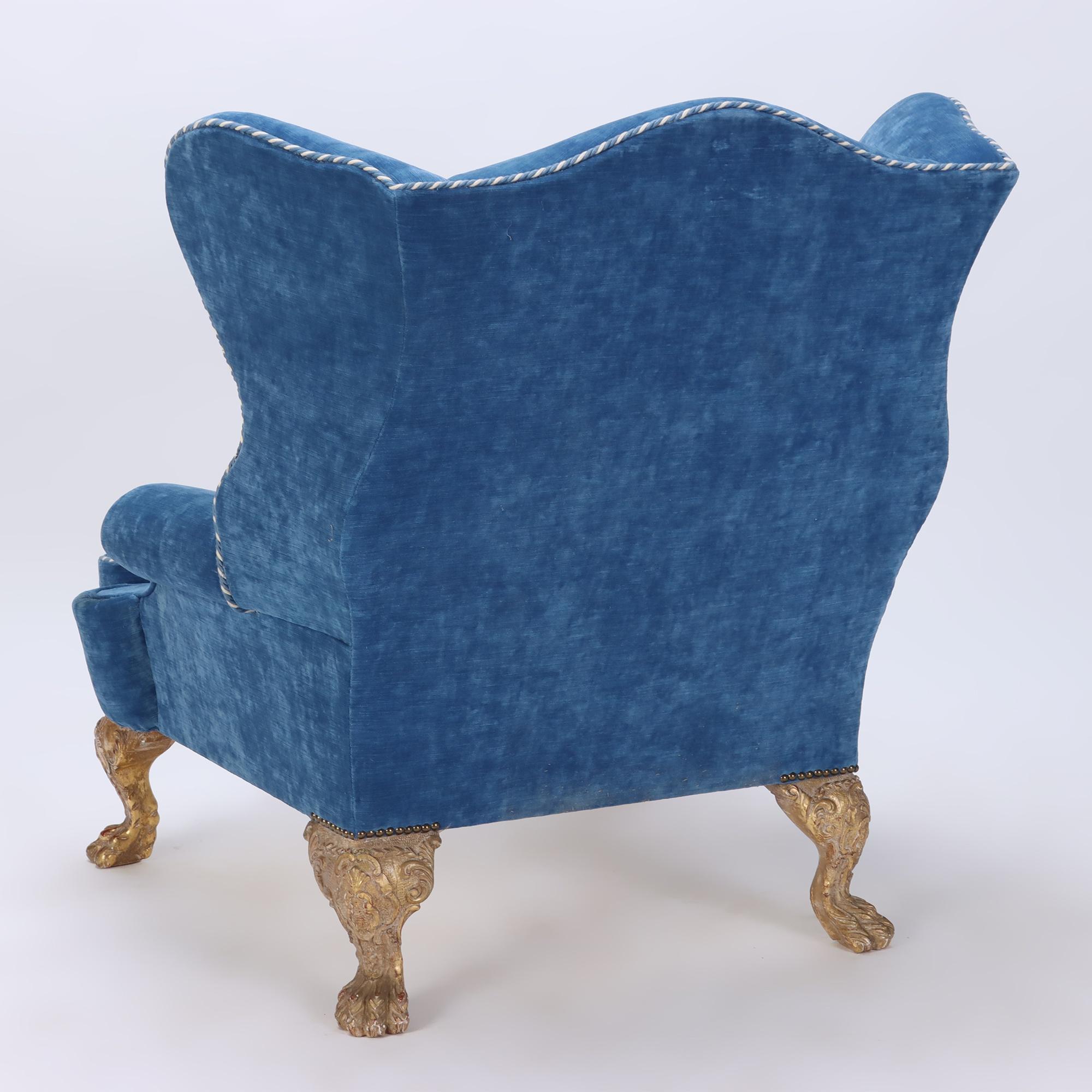Oversized and Exaggerated Blue Upholstered Wing Chair and Ottoman C 1900 In Good Condition For Sale In Philadelphia, PA