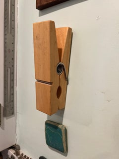 An oversized Clothes Pin note holder