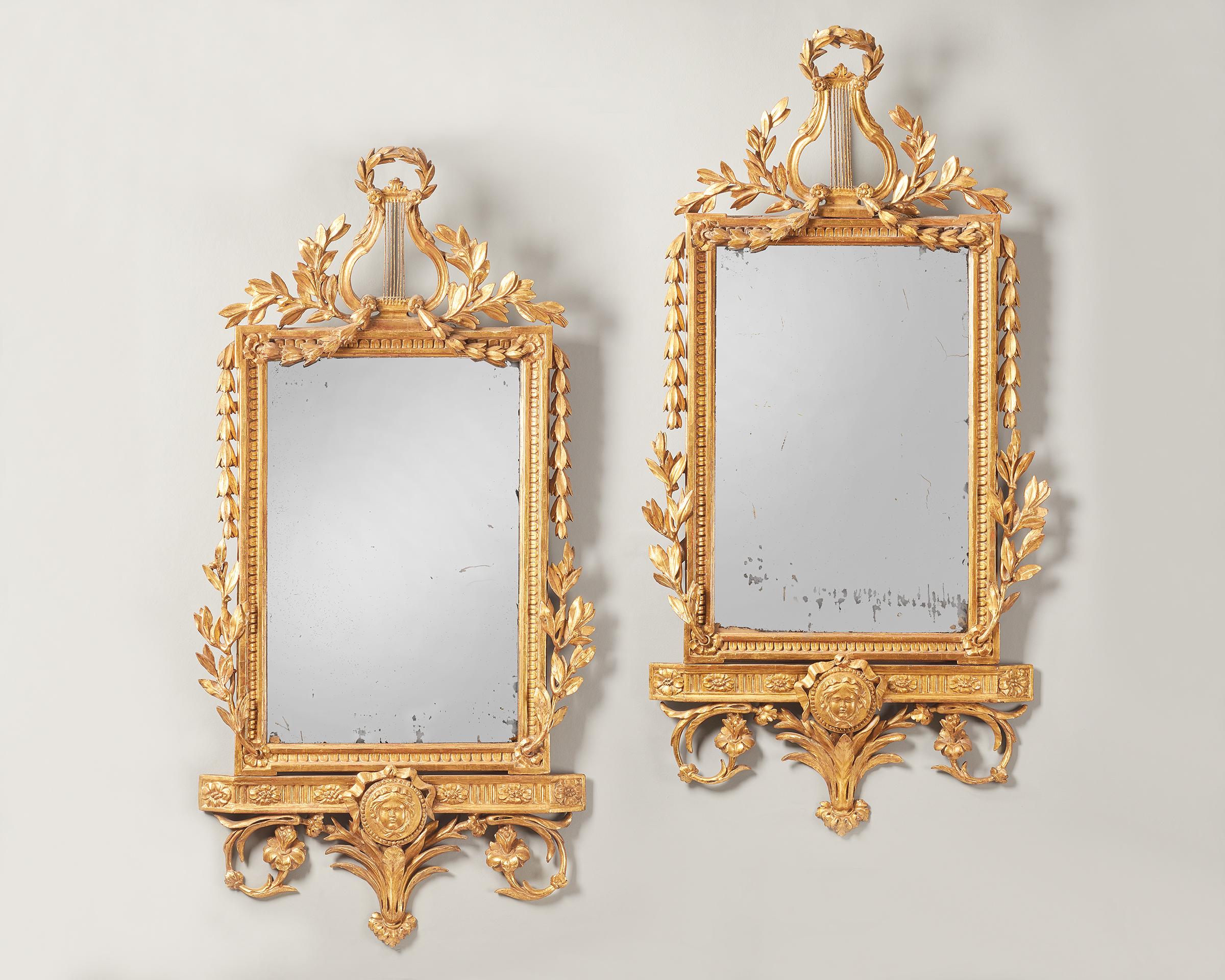 Carved Pair of 18th Century Spanish Giltwood Mirrors For Sale