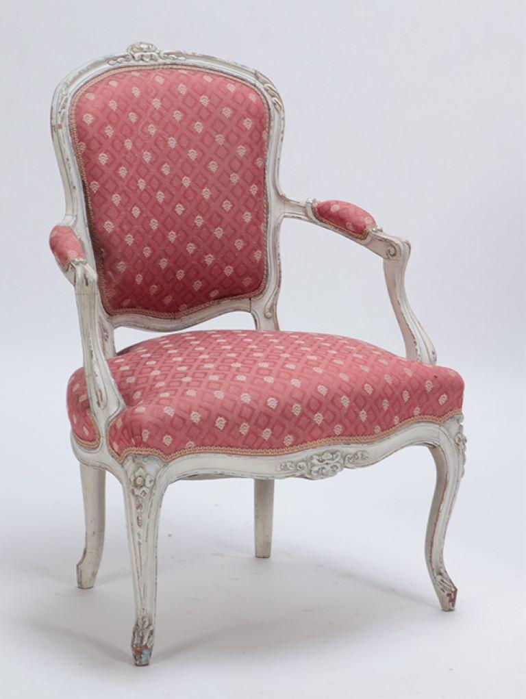 An elegant pair of painted and carved  French Louis XV style open arm chairs circa 1900. 