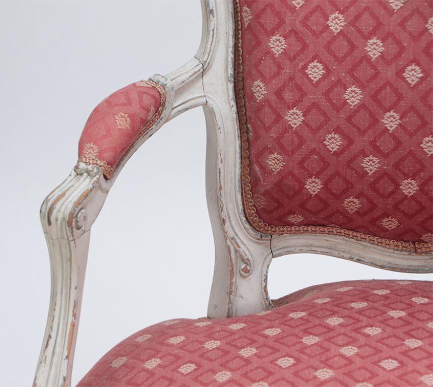 Upholstery An pair of painted and carved  French Louis XV style open arm chairs circa 1900. For Sale