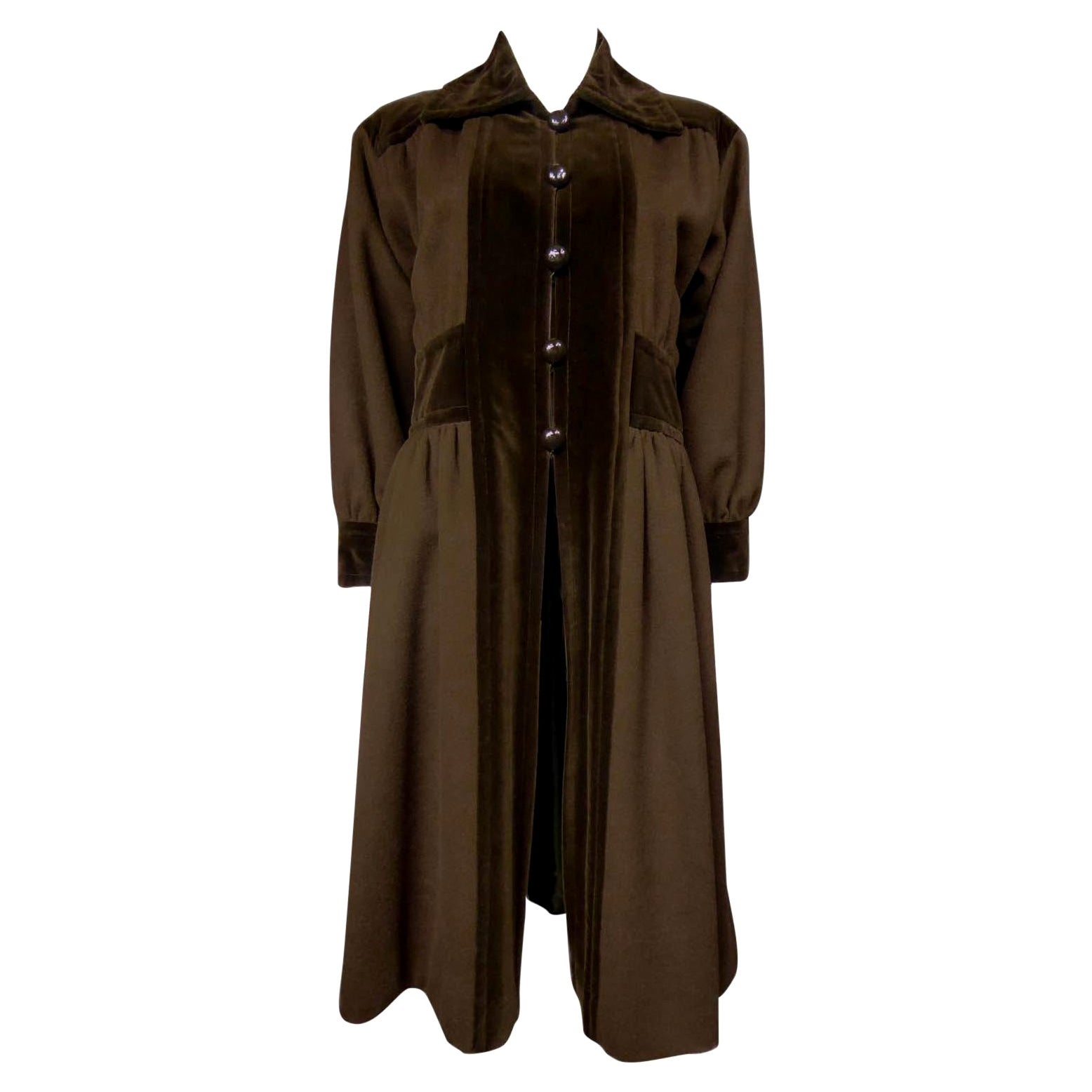 Circa 1976 – 1978
France
Yves Saint Laurent Rive Gauche coat from the 1976 Ballets Russes collection by the famous couturier in his most creative period. Beautiful brown brushed mohair wool and chocolate velvet more sustained. Coat with placket,