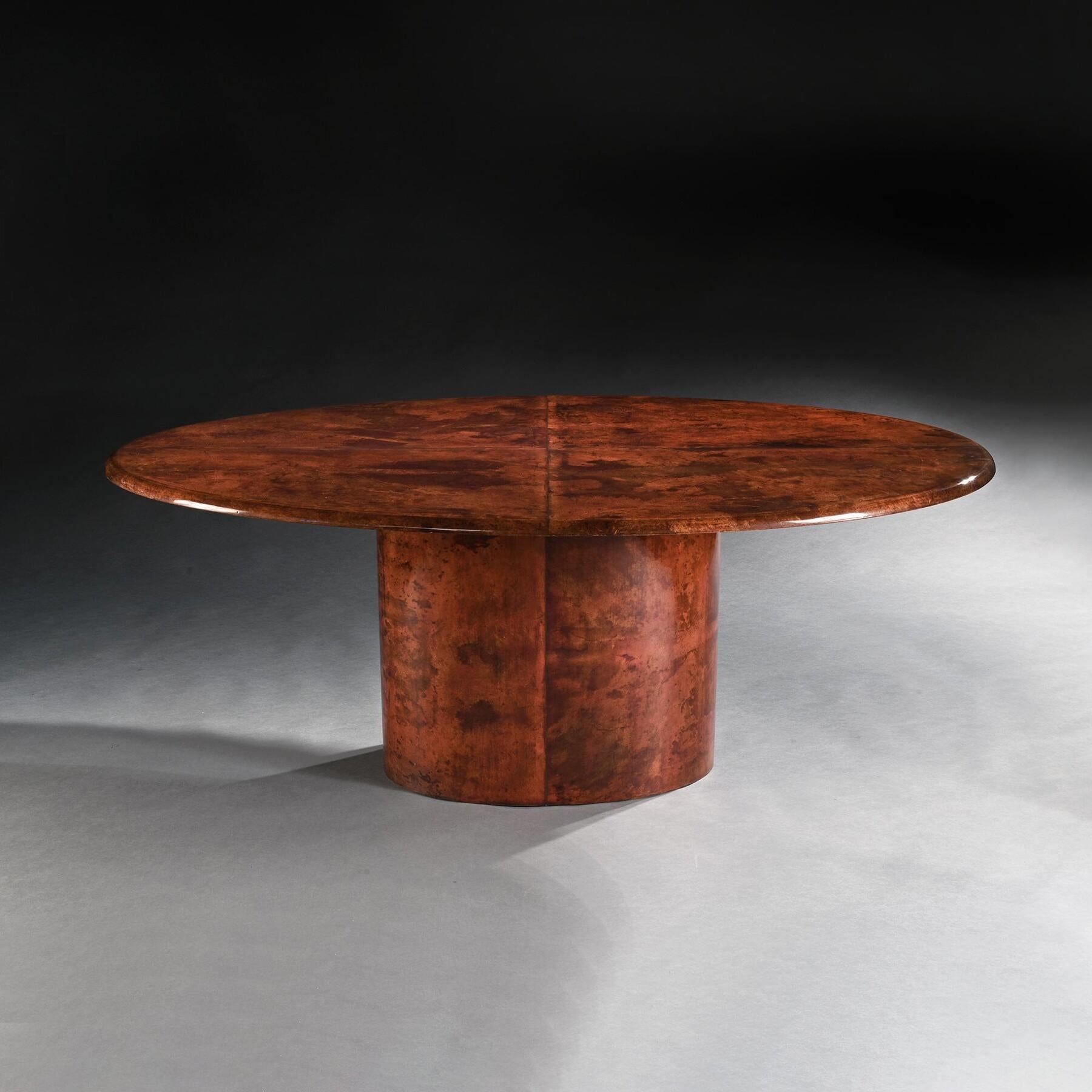 An über chic Italian Aldo Tura tobacco coloured lacquered goatskin / parchment elliptically shaped dining table by renowned Italian Desinger Aldo Tura in the mid 20th Century, a fine example.
Italy, mid 20th century - circa 1960 -70.
Of elliptical